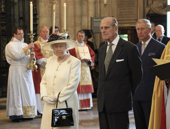 Always in waiting: Prince Charles looks on as Queen Elizabeth and Prince Philip attend a service of celebration to mark the 400th anniversary of the King James Bible at Westminster Abbey in central London in 2011.