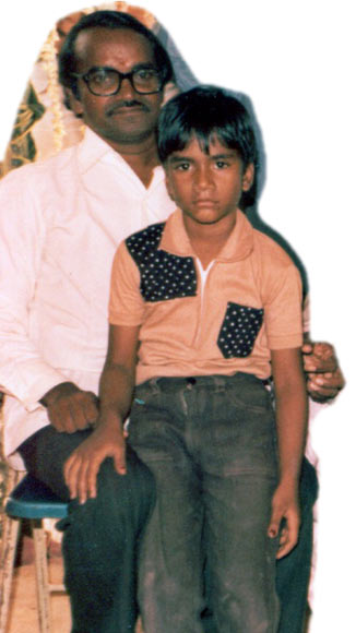 Devisetty Vinay Kumar as a child with his father