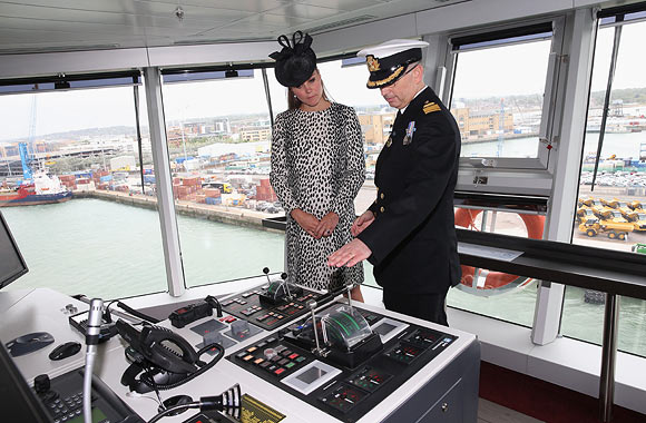 Captain Tony Draper gives Catherine, Duchess of Cambridge a tour on board the Princess Cruises ship during its naming ceremony at Ocean Terminal on June 13, 2013 in Southampton, England