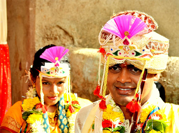 Manish Kamble and his bride on their wedding day