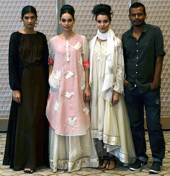 Vogue Fashion Fund 2013 semi-finalist Ajit Kumar with creations from his latest collection