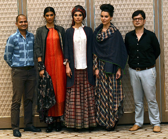Vogue Fashion Fund 2013 semi-finalist Amit and Richard with creations from their latest collection