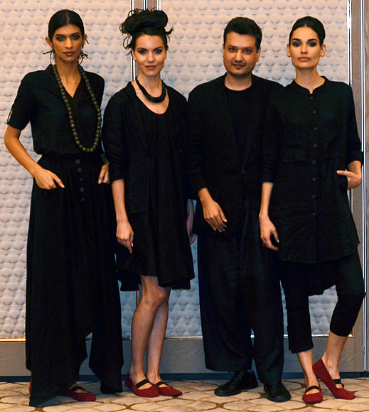 Vogue Fashion Fund 2013 semi-finalist Divyam Mehta with creations from his latest collection