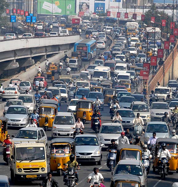 Vehicles move slowly during morning rush hour in the southern Indian city of Hyderabad