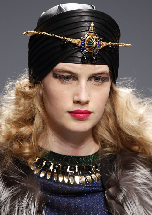 Manish Arora's models wore black leather turbans as they walked the ramp to music played on Indian instruments.