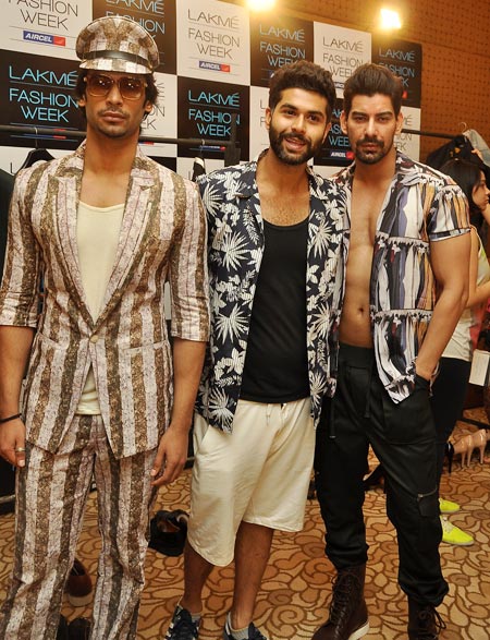 Models showcase Kunal Rawal's (centre) creations at the Lakme fittings
