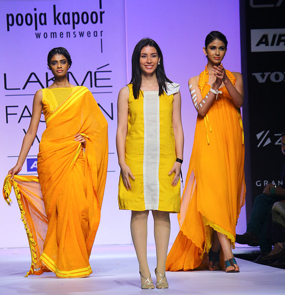 Designer Pooja Kapoor with her models