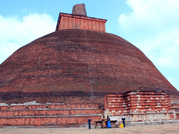 An ancient stupa towers over the ruins of Anuradhapura