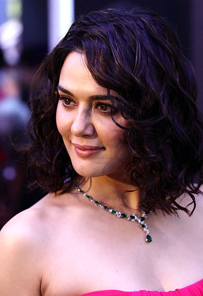 Preity Zinta has naturally curly hair, but when she straightens it, she ensures it's hydrated and well-protected