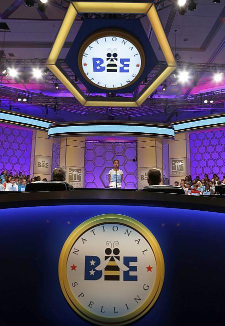 A competitor participates in the 2013 Scripps National Spelling Bee at the Gaylord National Resort and Convention Center at National Harbor in Maryland, May 29, 2013. 