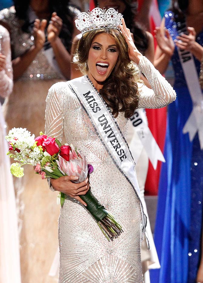 Miss Venezuela Gabriela Isler reacts after winning the Miss Universe pageant at the Crocus City Hall in Moscow 