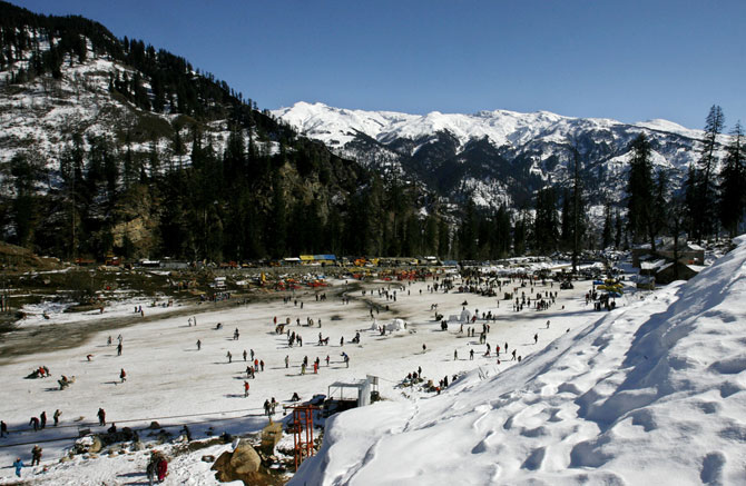 Tourists ski in Solang Valley in Himachal Pradesh.