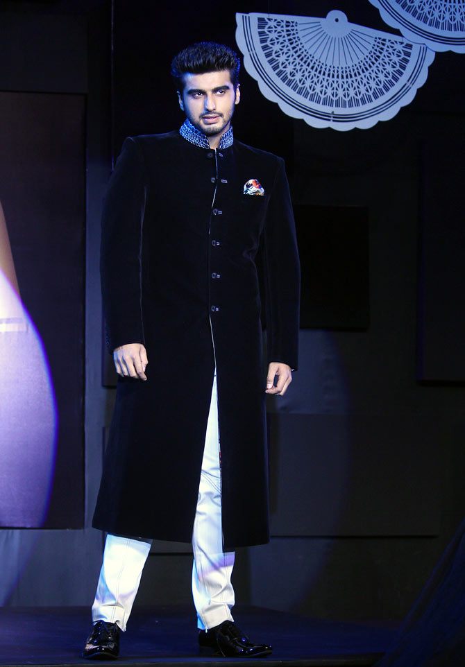 The royal look is in. Go for Sherwani-style suits. Stick to monochrome quite like Arjun Kapoor.