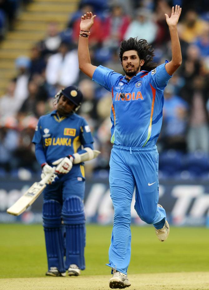 India's Ishant Sharma (R) celebrates after dismissing Sri Lanka's Kumar Sangakkara (not pictured) as Sri Lanka's Mahela Jayawardene looks on during the ICC Champions Trophy semi-final match at Cardiff Wales Stadium in Wales June 20, 2013.