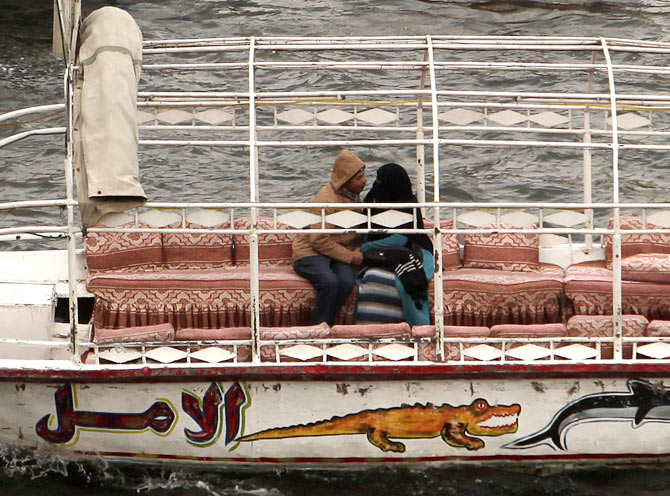 A couple enjoys a faluka (boat) ride on Valentine's Day on river Nile in Cairo, February 14, 2013. 
