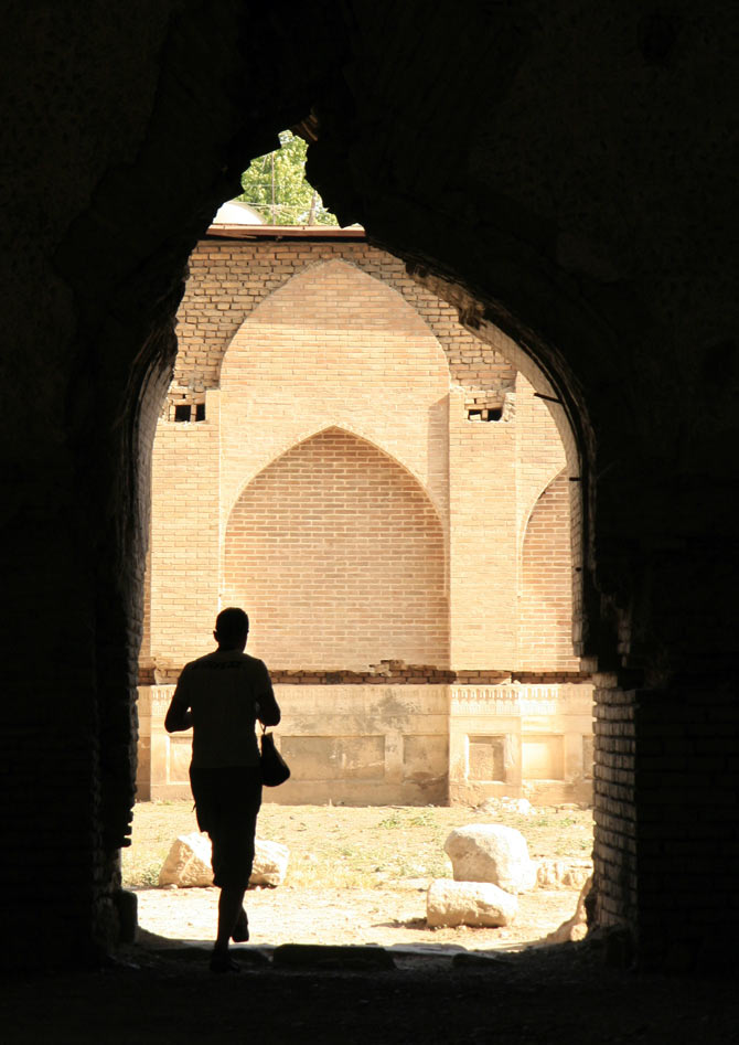 A man walks in Samarkand June 9, 2007. Sitting on the ancient Silk Road trade route which linked China with Imperial Rome, present-day Uzbekistan was once a key regional player which flourished in trade, culture and science.