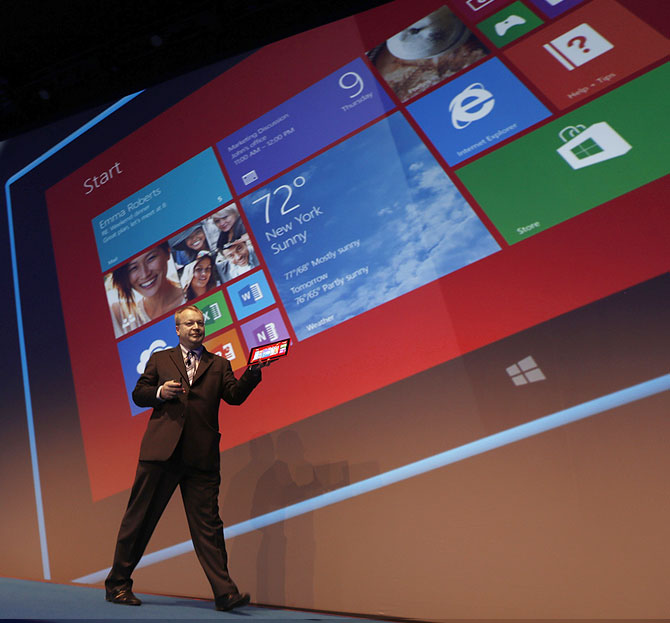 Nokia's former chief executive and the company's head of devices, Stephen Elop, displays the Lumia 2520 tablet.