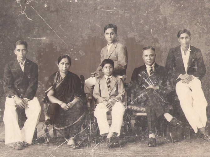 A family photograph of the Kulkarni family -- seen in the picture are the author's grandparents.