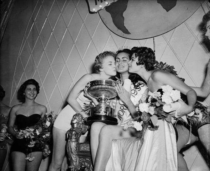 Carmen Susana Duijm Zubillaga of Venezuela after being crowned Miss World 1955 at the Lyceum Ballroom, London, 21st October 1955. First runner-up Margaret Anne Haywood of the USA can be seen on the left.