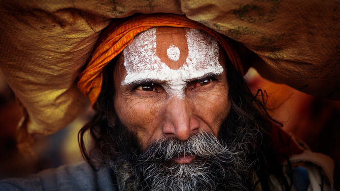 A nameless Hindu pilgrim makes his way around at the Kumbh mela.