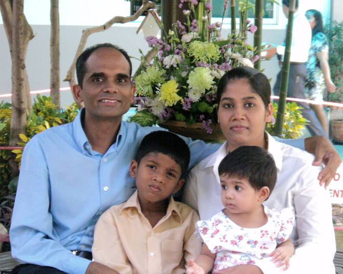 Joy Kuttappan and Gauri Swamy with their two children