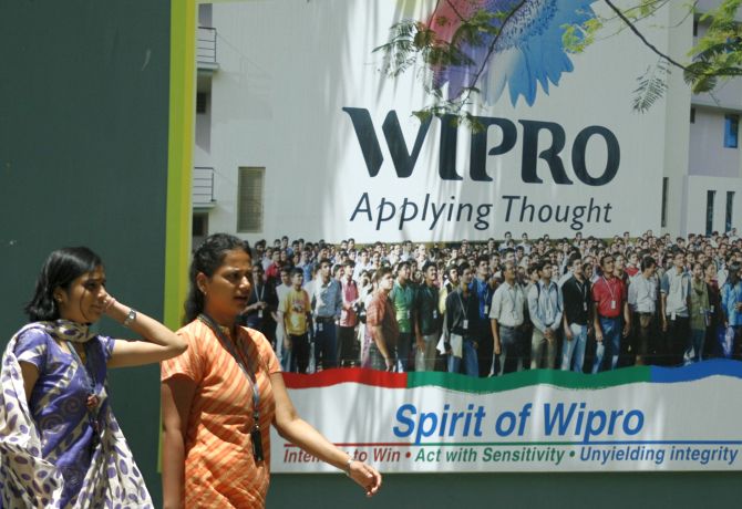 People walk in the Wipro campus in Bangalore.