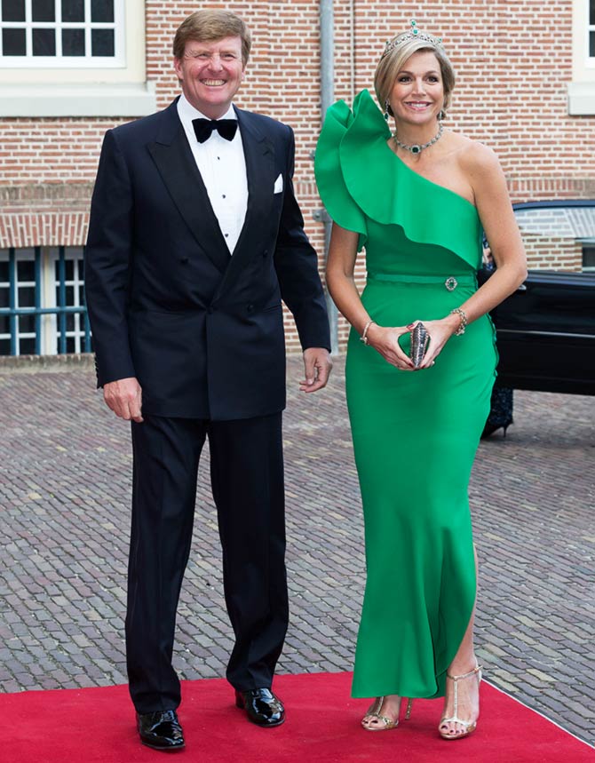 King Willem-Alexander of The Netherlands and Queen Maxima of The Netherlands arrive for dinner at the Loo Royal Palace on June 3, 2014 in Apeldoorn, Netherlands.
