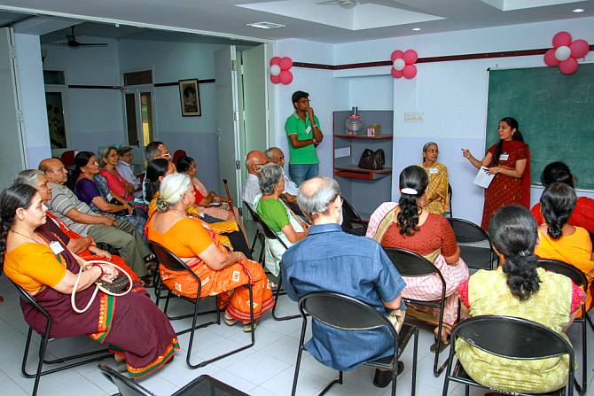 Rama Murali addressing a meeting of caregivers in Chennai