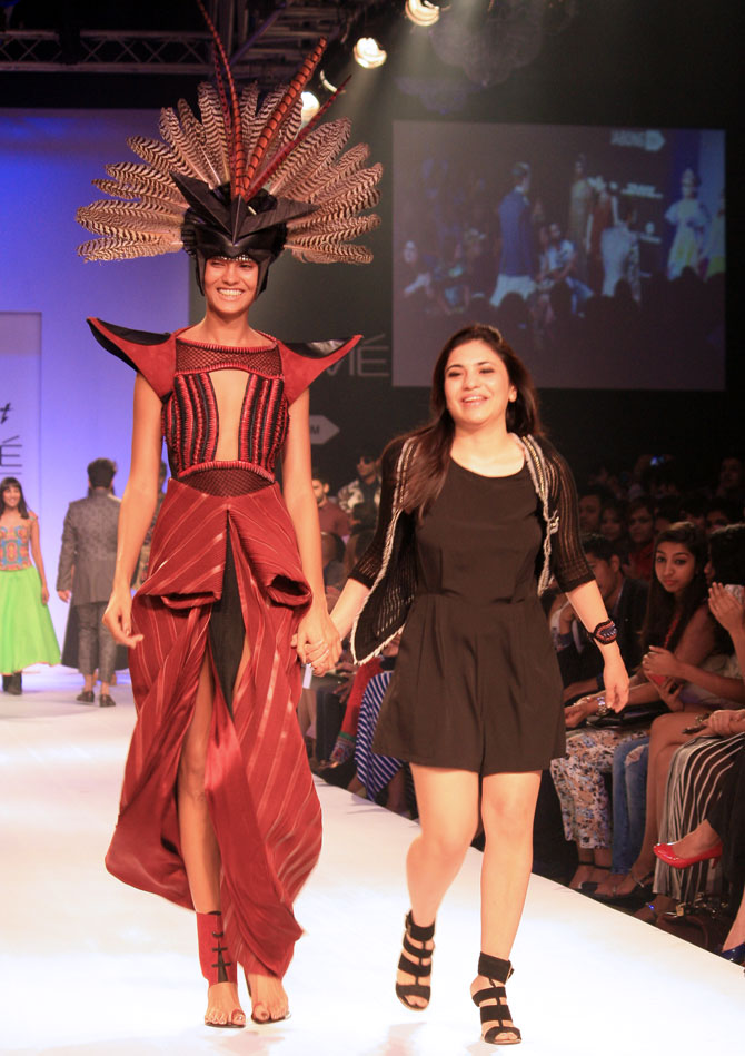 Neha Agarwal with a model showing the designer's creation.