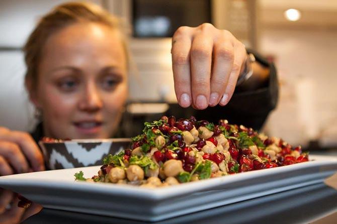 A Damson chef gives finishing touches to a dish