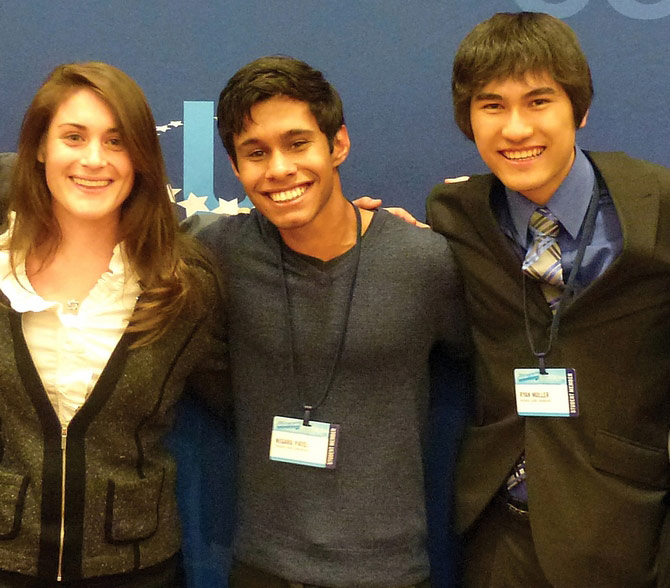 Nisarg Patel, center, with some of the HydroGene team members at the Clinton Global Initiative University.