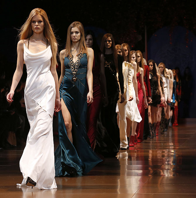 Models in Versace creations