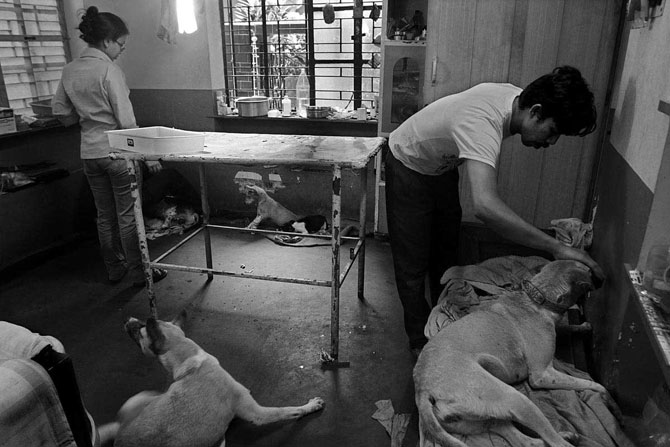 Sandip Karan examines a patient in his home-hospital