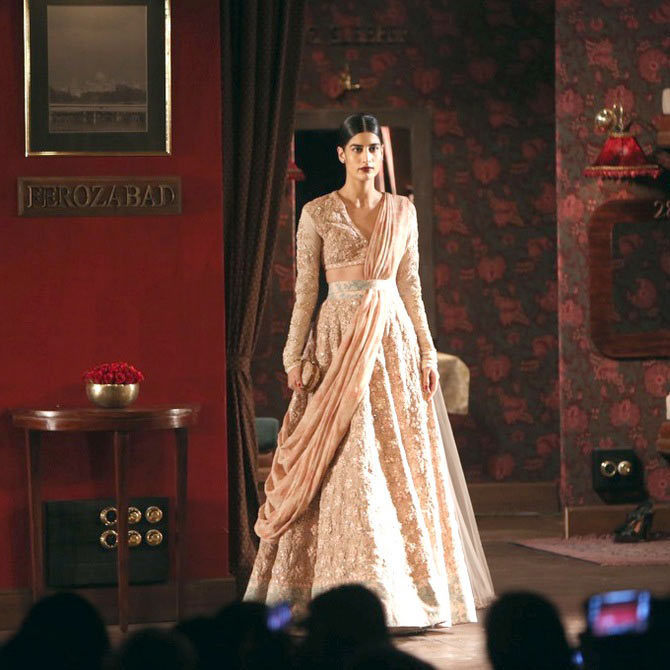 A model presents a design by Sabyasachi Mukherjee at India Couture Week.