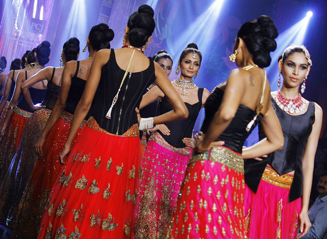 Sonal Rawat walks the runway at the India International Jewellery Week.