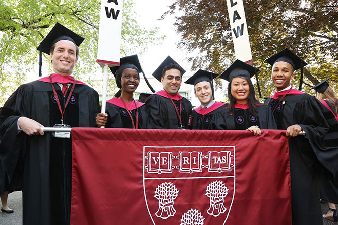 Harvard Law students pose with batchmates on their Graduation Day