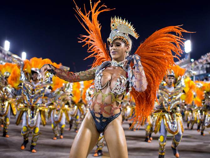 Members of Unidos da Tijuca Samba School during their parade at 2014 Brazilian Carnival at Sapucai Sambadrome in Rio de Janeiro, Brazil.