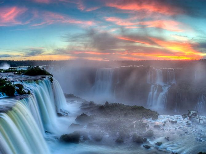 A breathtaking evening at the Iguazu Falls located on the border of the Brazilian state of Parana and the Argentinan province of Misiones.