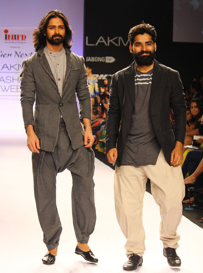 Ujjawal Dubey (right) with a model in his creation
