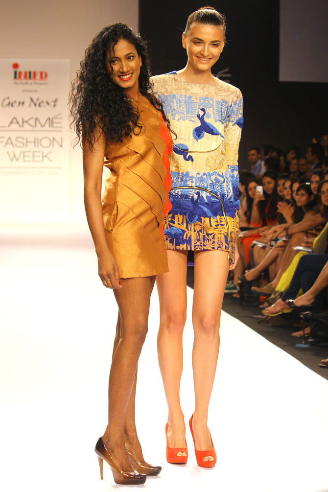 Vilvin Sabu (left) poses with a model wearing her collection