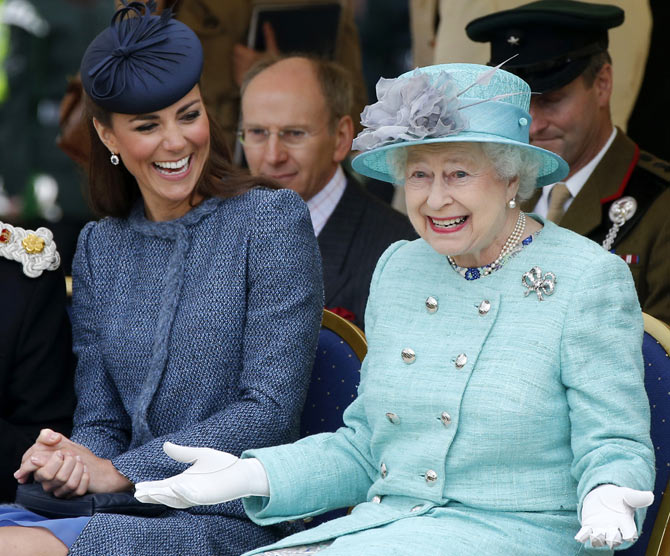 Queen Elizabeth and Kate share a laugh at a children's sports event in Nottingham's Vernon Park.