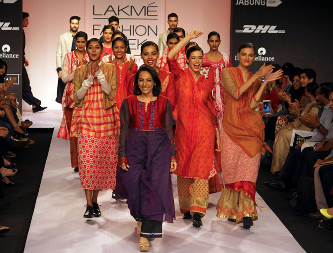 Designer Krishna Mehta on the ramp with models