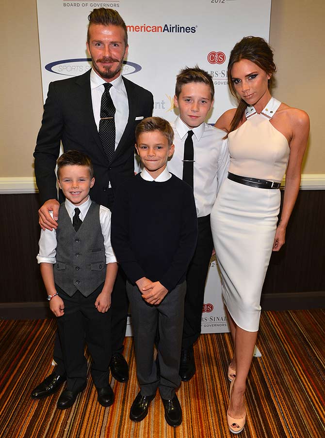 David Beckham, wife Victoria Beckham and sons (L-R) Cruz, Romeo and Brooklyn Beckham