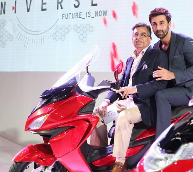 Ranbir Kapoor with Hero MotoCorp's MD and CEO Pawan Munjal at the showcasing of 125cc Dare scooter at Auto Expo 2014