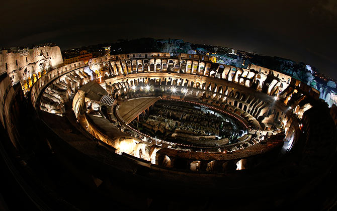 The ancient Colosseum is pictured before the Via Crucis (Way of the Cross) procession in downtown Rome.