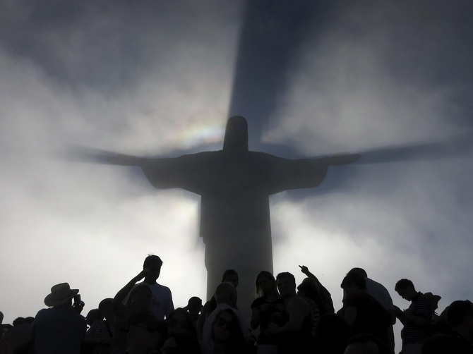 May the lord help you! Don't expect any value for money, good hotels or shopping options in Rio, say TripAdvisor users. Seen here is the statue of Christ the Redeemer casting a shadow on passing clouds atop of Corcovado mountain in Rio de Janeiro.