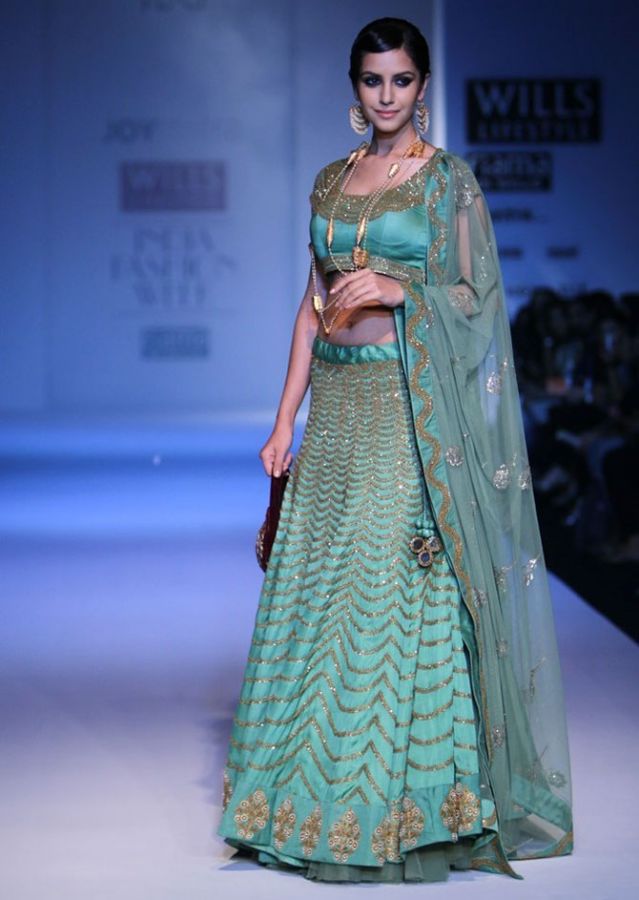 Koyal Rana walks the ramp for Joy Mitra at Wills India Fashion Week.