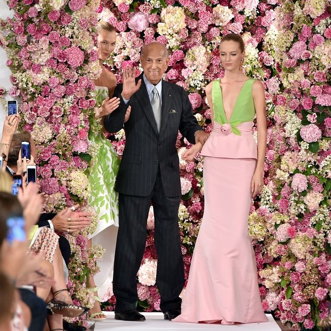 Designer Oscar de la Renta (C) and model Karlie Kloss (L) walk the runway at the Oscar De La Renta fashion show during Mercedes-Benz Fashion Week Spring 2015 on September 9, 2014 in New York City.