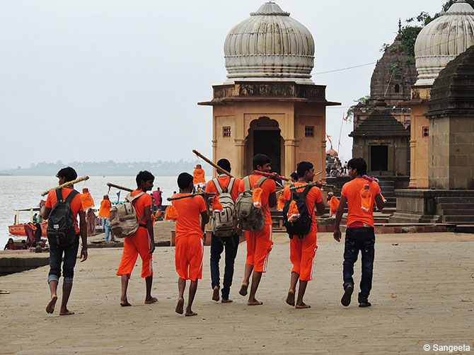 Kavad Pilgrims dressed in flaming orange