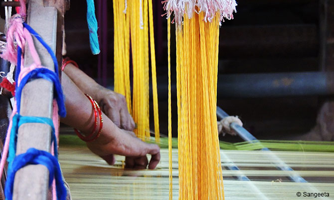 A lady at work at Maheshwari Weaving Centre